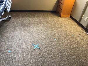 Slab leak detection marked by the 'X'.